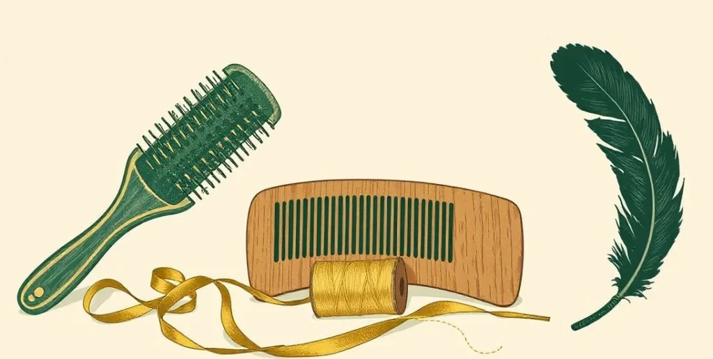 Illustration of a hairbrush and comb beside gold thread and a raven feather